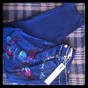 Denim colored leggings with butterfly detail